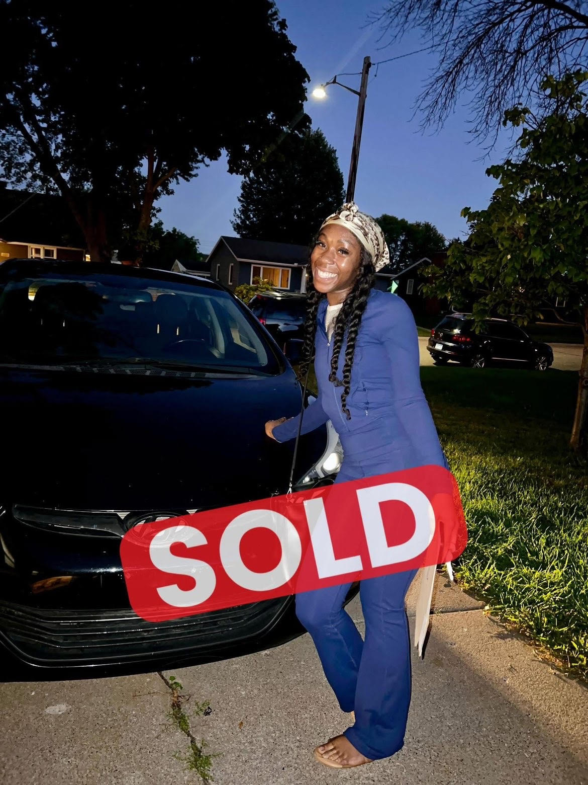 Happy customer with their vehicle