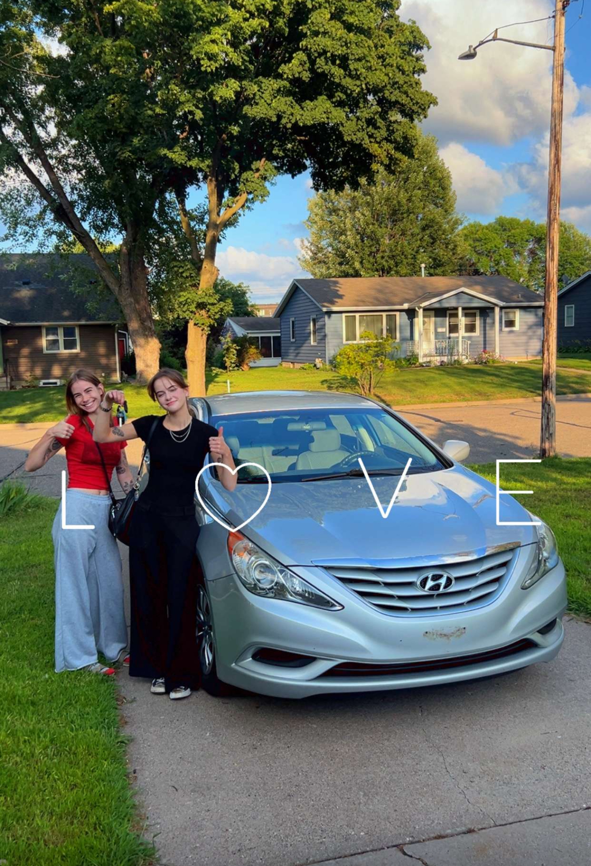 Happy customer with their vehicle