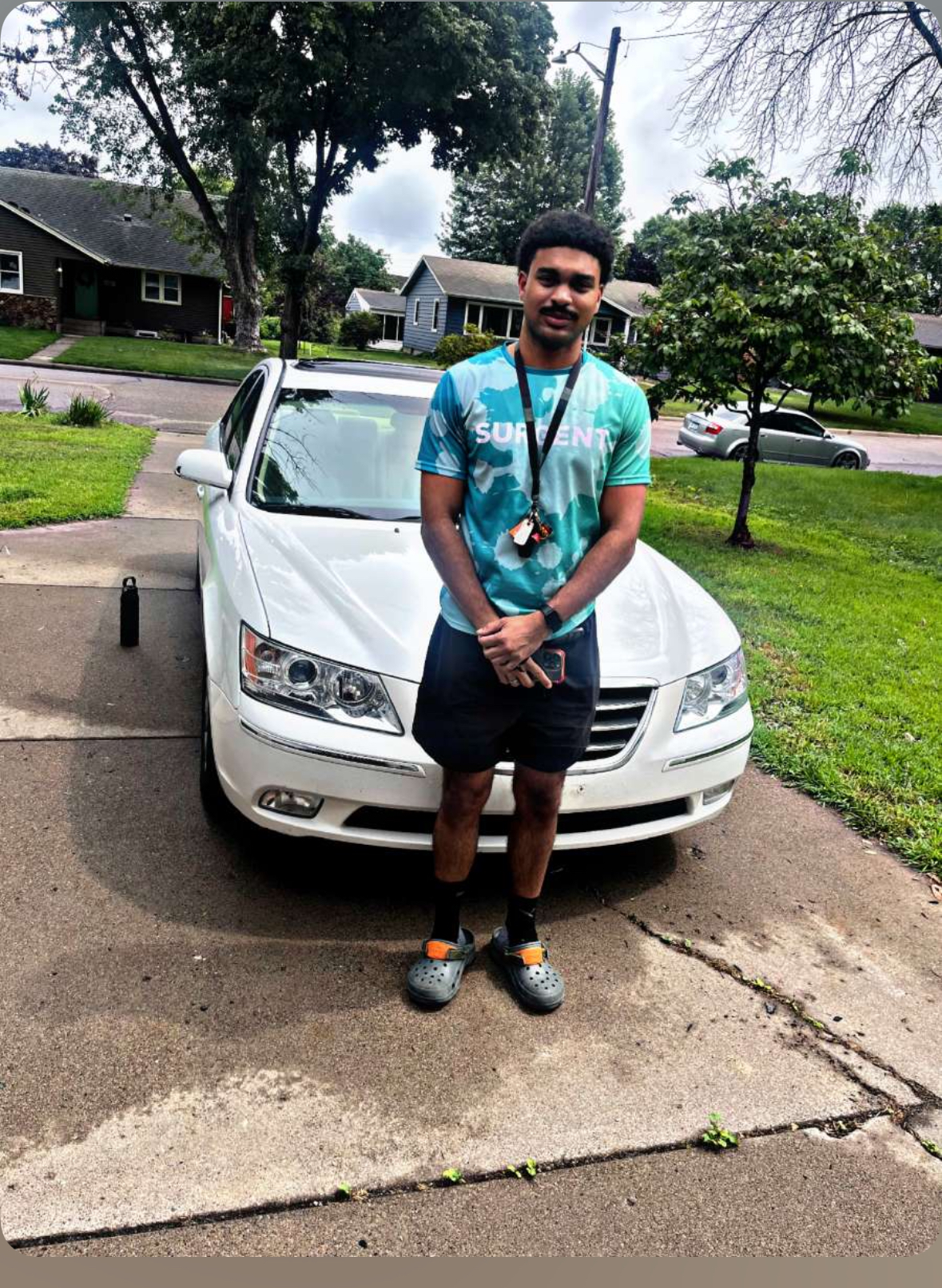 Happy customer with their vehicle