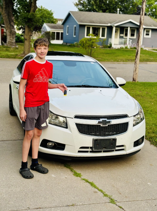 Happy customer with their vehicle