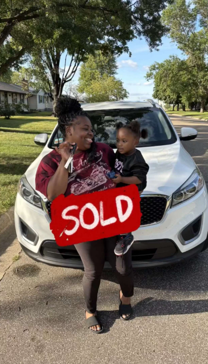 Happy customer with their vehicle